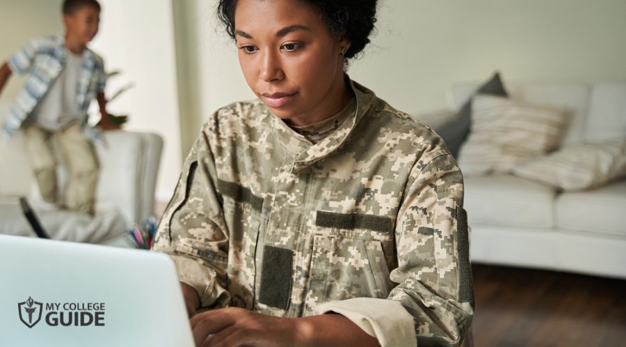 female soldier taking online class at home